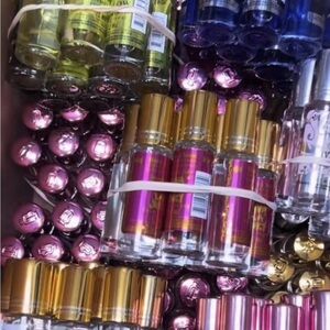 Assorted Fragrance Bottles with Gold and Pink Accents unisex wholesale only